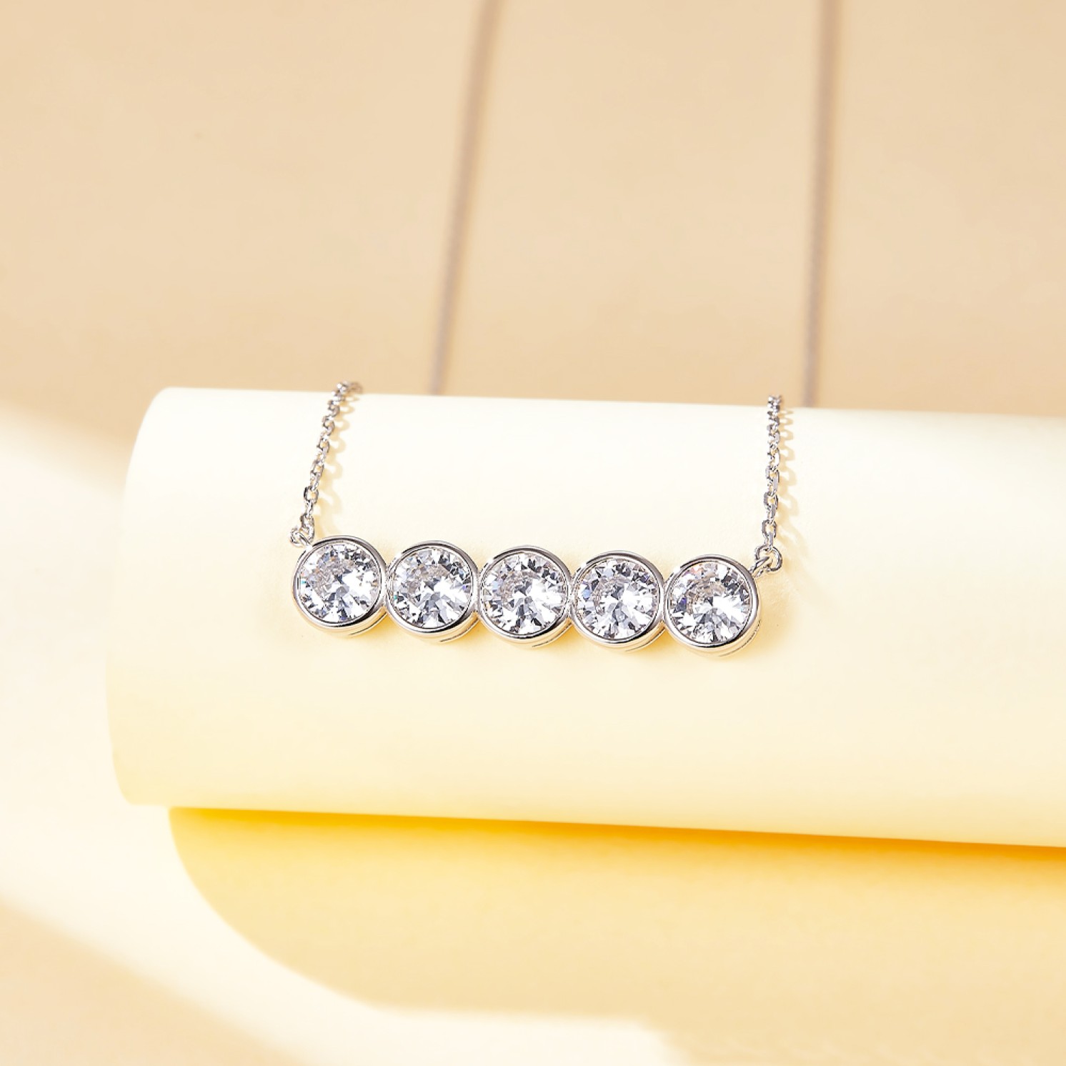 Quinta - Five Stone Moissanite Necklace in Bezel Setting