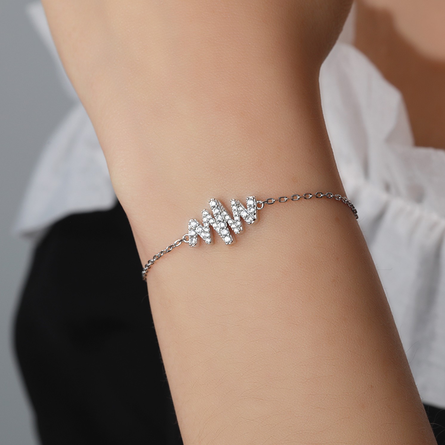 Spiralux - Adjustable Moissanite Bracelet with Pave Symbol Design