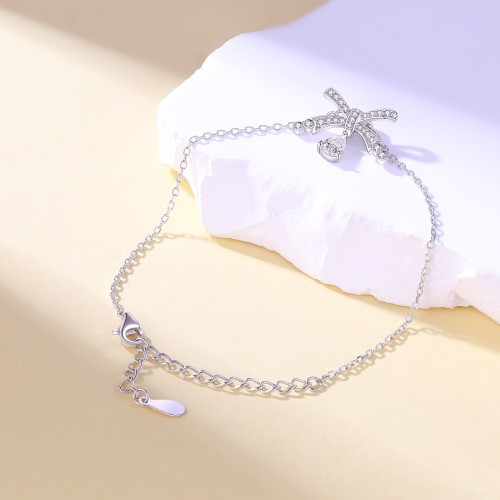 Pearlette - Pear-Shaped Moissanite Bow Bracelet With Pave Setting