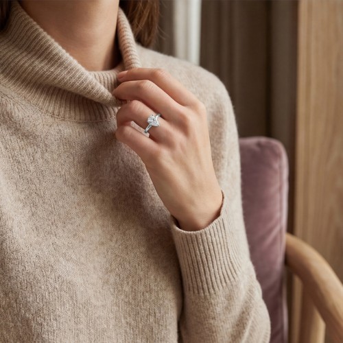 Poirine - Pear Cut Moissanite Ring with Hidden Halo and Pavé Accent Stones - lifestyle