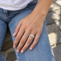 Duetta - Round Moissanite Eternity Band with X Motifs