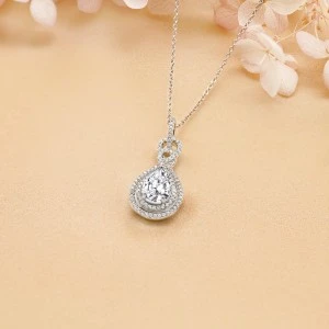 Pearla - Pear-Cut Moissanite Pendant in Double Halo Design