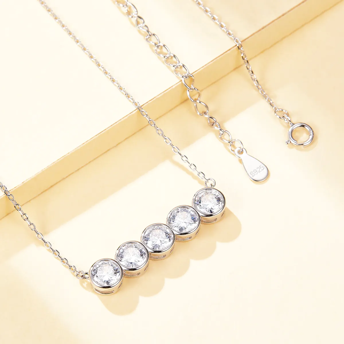 Quinta - Five Stone Moissanite Necklace in Bezel Setting