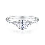 Ovaline - Moissanite Ring with Minimalistic Side Stones Ovaline - Moissanite Ring with Minimalistic Side Stones