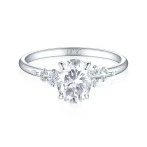 Ovaline - Moissanite Ring with Minimalistic Side Stones Ovaline - Moissanite Ring with Minimalistic Side Stones