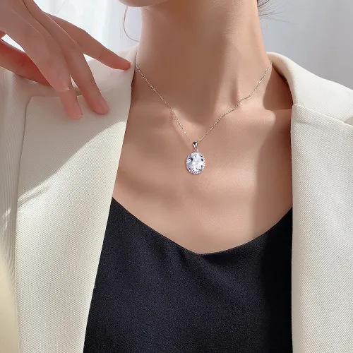 Clarique - Classic Oval-Shaped Moissanite Pendant with Pavé Halo - lifestyle