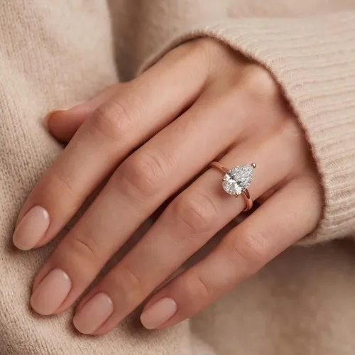 Larissa - Pear Solitaire Moissanite Ring - lifestyle