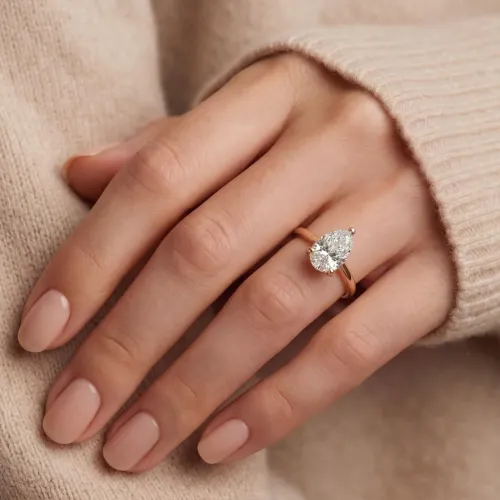 Larissa - Pear Solitaire Moissanite Ring - lifestyle