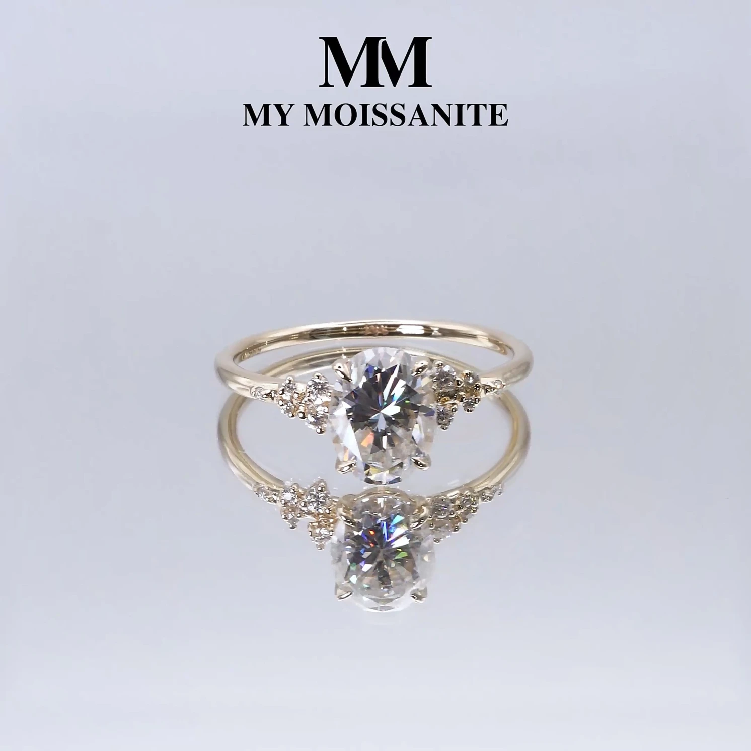 Ovaline - Moissanite Ring with Minimalistic Side Stones Ovaline - Moissanite Ring with Minimalistic Side Stones